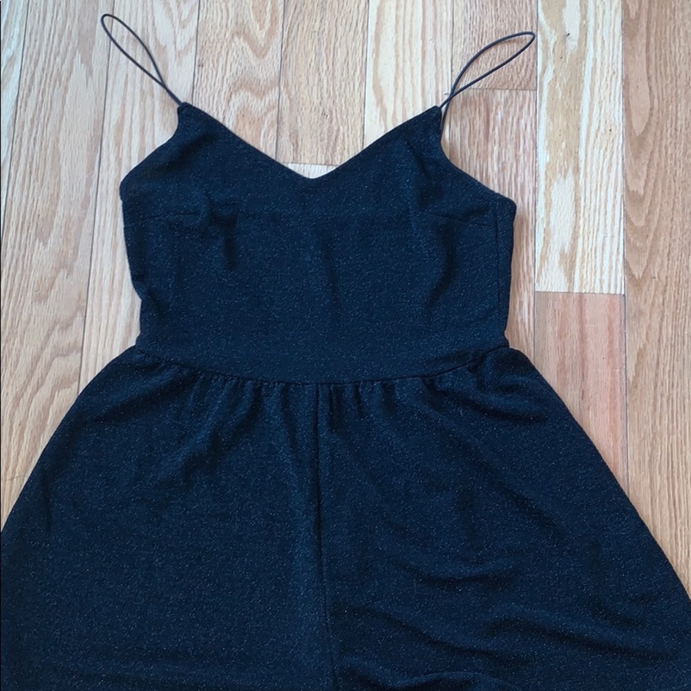 Divided sparkly romper size Small